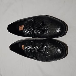 Mezlan black loafers.